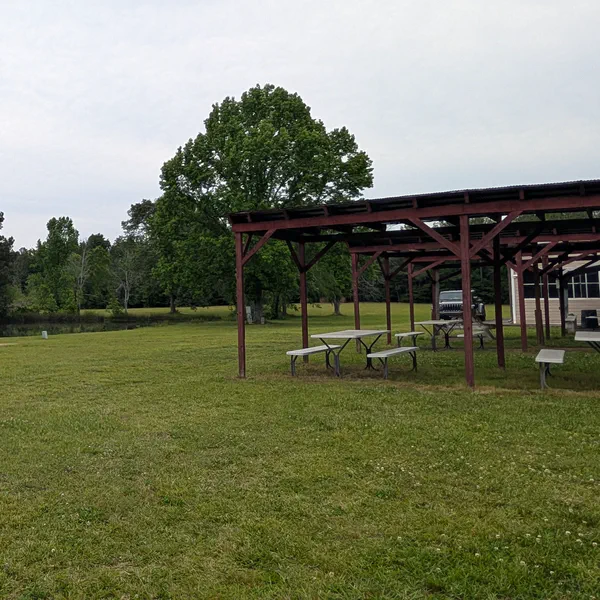 The covered picnic pavilion on the right and the gazebo on the left — available for rental events.